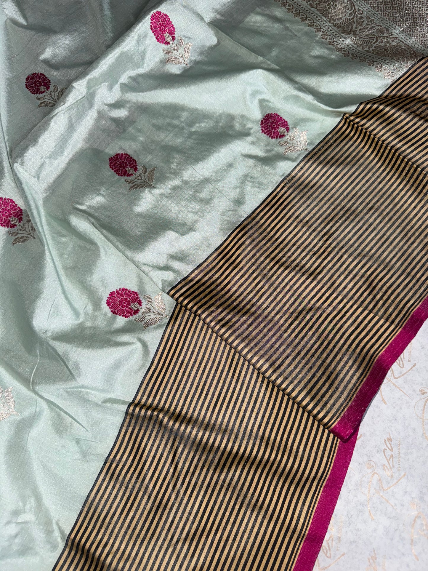 Handwoven Ice Blue Katan Silk Striped Border With Kadhwa Meenakari Butas Banarasi Saree