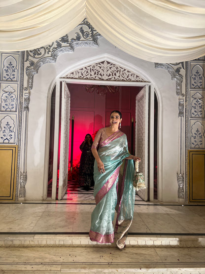 Handwoven Firozi Tissue Saree With Pink Silk Scallop Borders