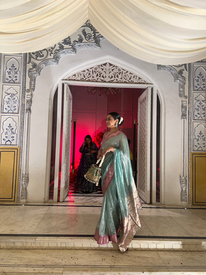 Handwoven Firozi Tissue Saree With Pink Silk Scallop Borders