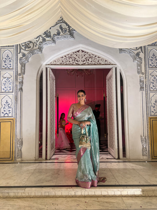 Handwoven Firozi Tissue Saree With Pink Silk Scallop Borders