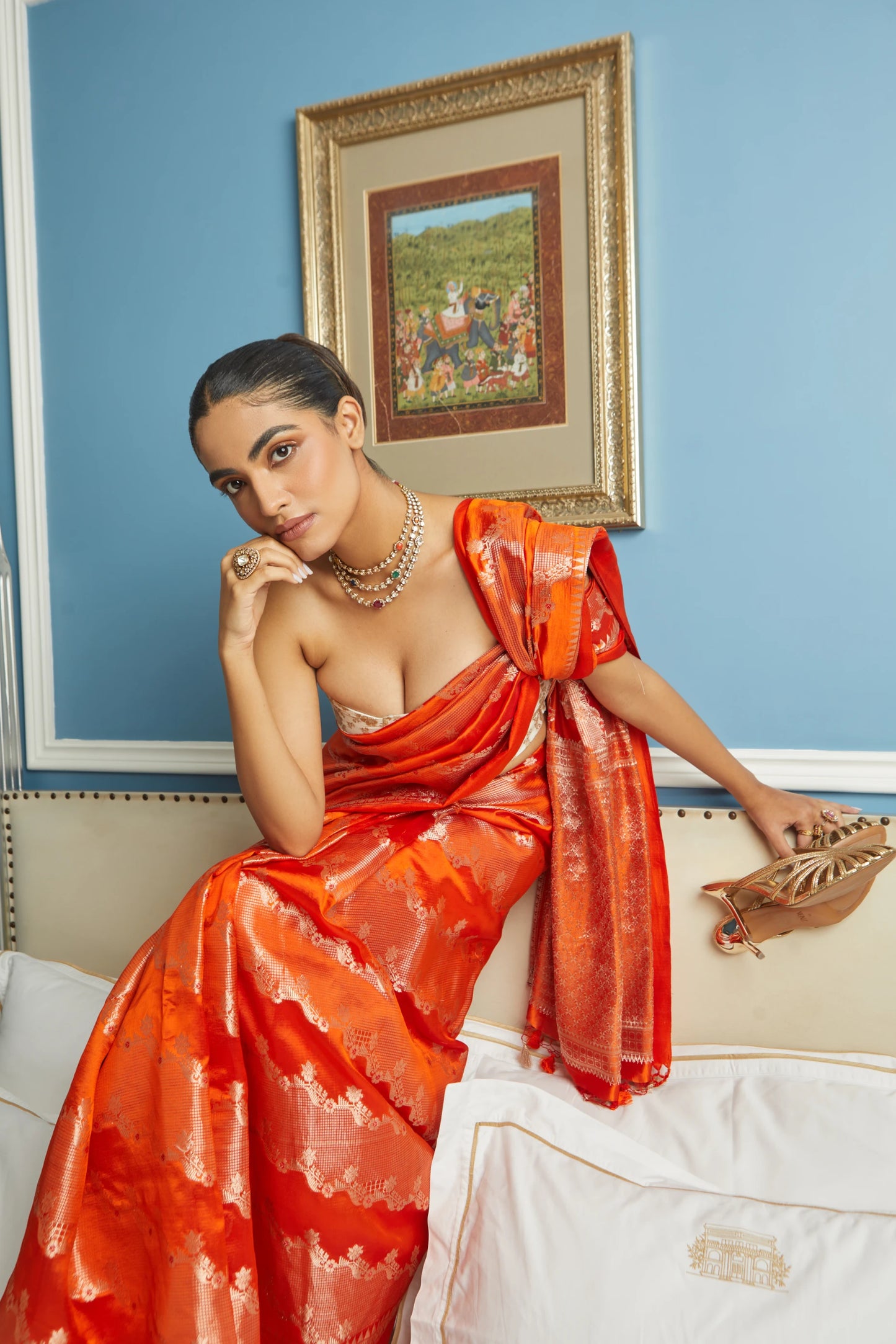 Handwoven Orange Soft Silk Saree With Aari Design Adorned With Red Meenakari